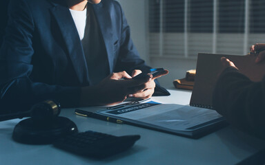Lawyer explained to the client about the law that must be brought against the court case.