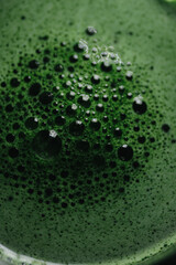 Spirulina drink in water, organic green superfood, healthy detox beverage