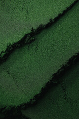 Spirulina powder close up, green superfood, organic healthy supplement