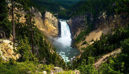 Waterfall cascading down canyon