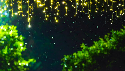 Twinkling yellow fairy lights illuminate a dark night sky with green trees and falling snow
