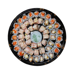 sushi Japanese food, assorted fish, on a ceramic plate