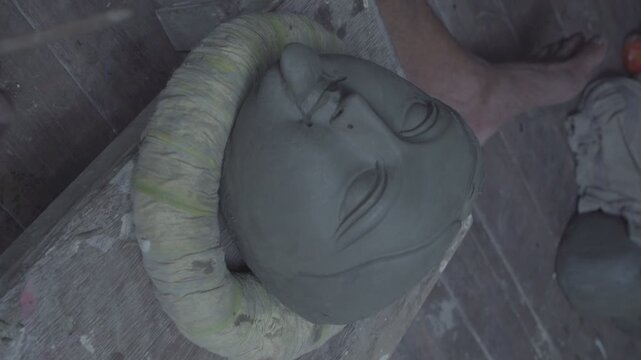 Ma Durga's face is making using clay \ bengali culture \ bengali festival 