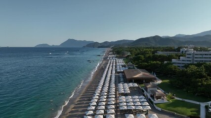 Tekirova, Turkey - June 5 2025: Aerial view of swimming pool and beach of luxury hotel Rixos