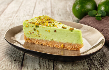 Green pistachio cheesecake served mint