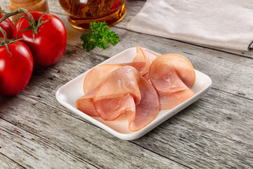 Smoked pork tenderloin fillet slices