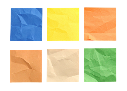 Six crumpled sticky notes in different  colours against white background