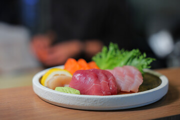Japanese Sashimi: Salmon, Tuna, and Scallops. Ideal for: Sushi and sashimi lovers, Japanese food, and high-end restaurants.