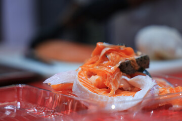 Salmon scraps left over from trimming, Salmon scraps, Salmon trimmings,  skin scraps.