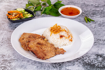 Roasted pork steak with rice