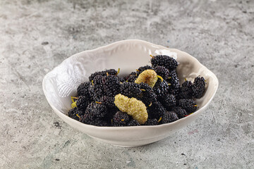 Ripe sweet juicy black and white mullberry