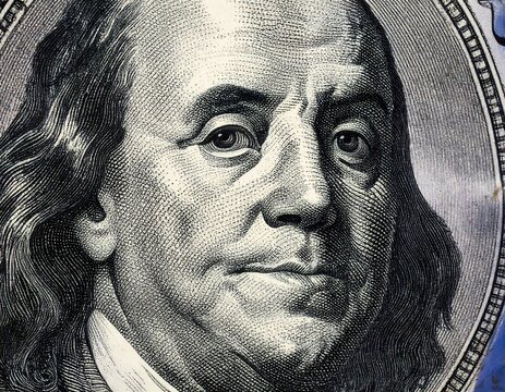 Close-up portrait of Benjamin Franklin on a US one hundred dollar bill - Powered by Adobe