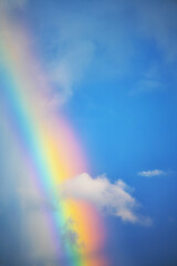 rainbow and blue sky. Vivid colors due to a polarizer (filter)
