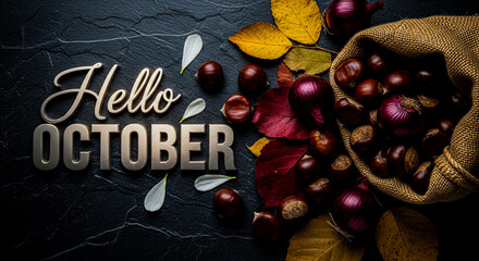 A rustic dark textured surface adorned with autumn elements, featuring the words hello october in a metallic font alongside a burlap sack overflowing with chestnuts and red onions