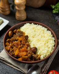 Delicious beef stew served with fragrant rice, showcasing vibrant colors and rich textures in a cozy dining setting