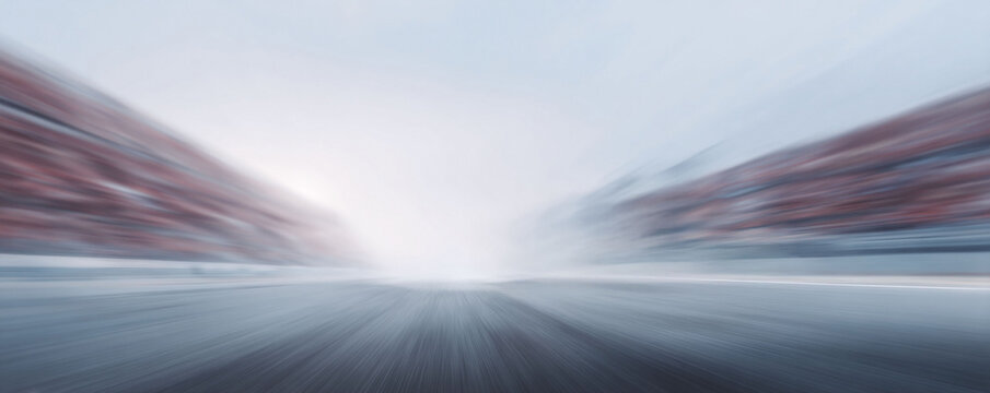 Motion blur race track view with blurred spectator seating. Evokes speed, adrenaline, competition, and highperformance themes. Great for sports, business or aspirational content.