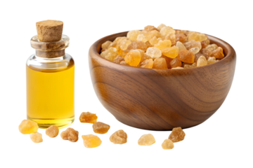Frankincense resin and oil in wooden bowl