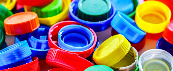 Different sorts of colorful plastic bottle caps. Recycling
