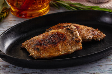 Roasted pork schnitzel steak piece
