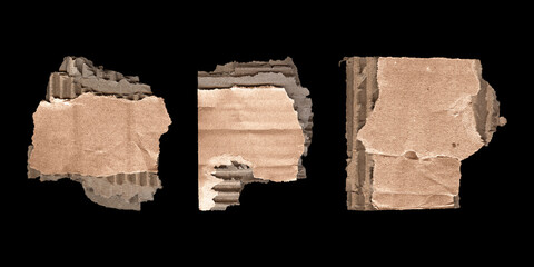 cardboard labels and note pieces set on black background
