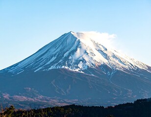 Fototapeta premium Snowy mountain peak, clear sky