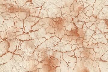 Fototapeta premium A textured surface displays intricate cracks in warm beige and muted orange tones, evoking a sense of aged, weathered stone.
