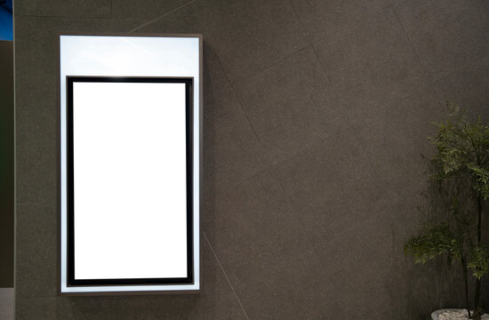 Blank billboard on wall.