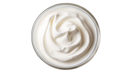 A close-up view of a creamy. textured whipped topping in a glass jar. its smooth surface and soft peaks. ideal for culinary presentations and dessert recipes