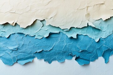 Fototapeta premium A textured, layered composition of torn paper pieces in shades of pale beige, light teal, and deep teal, creating a unique abstract design.