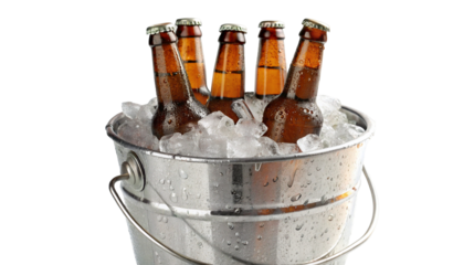 Chilled beer bottles in metal bucket filled with ice for refreshing summer drinks and parties
