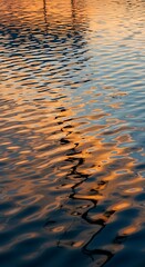 Golden hour reflections casting a mesmerizing glow on rippling water