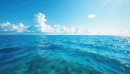 Fototapeta premium Vast, endless ocean meeting the sky at the horizon Calm waves gently roll towards the distant line where sea and sky blend seamlessly A breathtaking view of nature's majesty , horizon, blue, scene