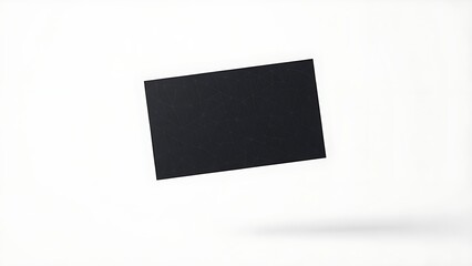 An elegant business card floating in mid-air against a clean, minimalist white background.