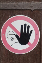 Sign showing a person raising a hand, no access, warning, restricted area, safety concept
