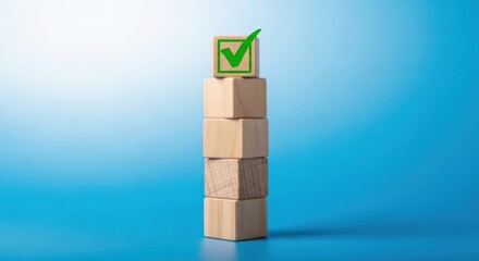 Stack wooden blocks with success and achievement progress toward completion and quality