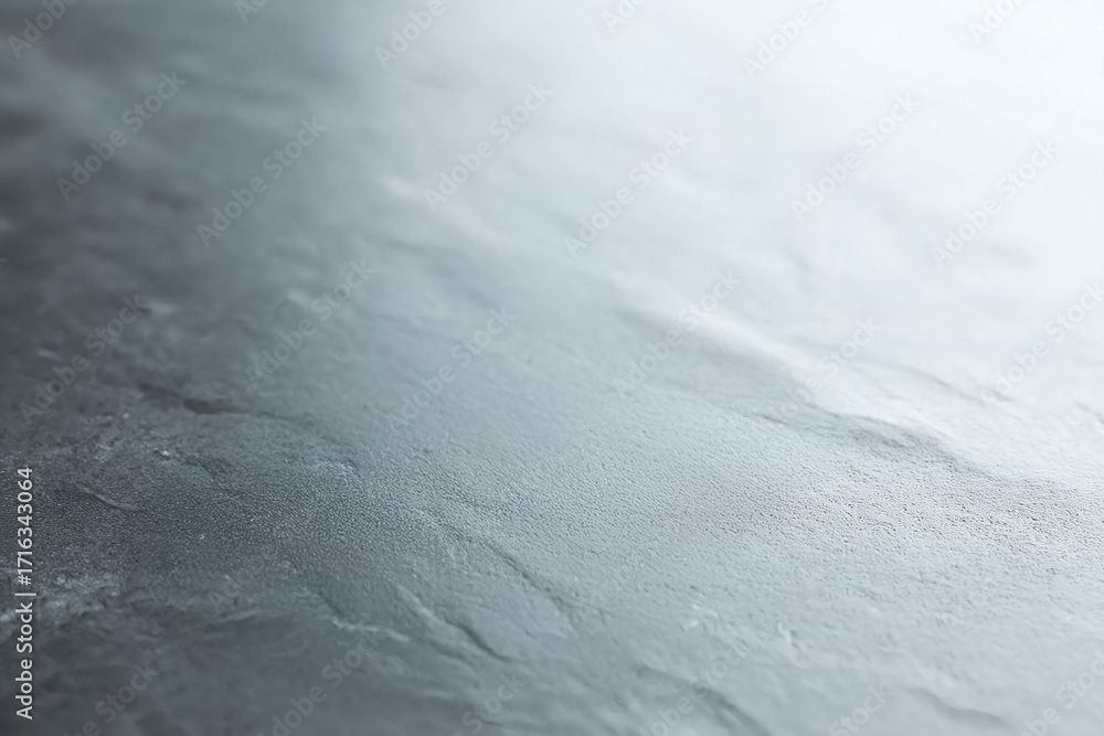 Poster abstract texture background with a shallow depth of field, showing subtle gray tones and delicate pa