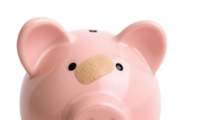 Closeup of pink piggy bank with bandage on nose symbolizing financial recovery, budget repair, economic crisis, and savings protection