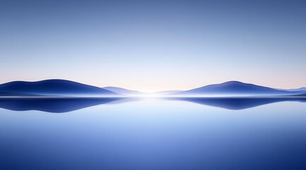 Serene landscape with calm water reflecting distant mountains at sunrise