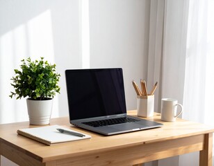 Fototapeta premium Minimalist home office setup with laptop, plant, and coffee mug on wooden desk
