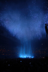spectacular scene of drone light show illuminating concert stadium instead of traditional spotlights
