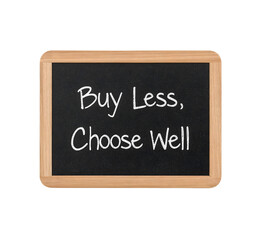 Obraz premium Minimalist lifestyle message on blackboard: buy less, choose well, simple wooden frame, sustainable consumption concept, white chalk writing