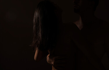 Couple in love face to face, tender hugging and kissing. Beautiful woman and handsome man boyfriend. Sexy photo