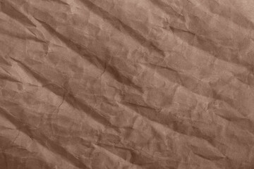 Abstract wrinkled brown crumpled paper texture background