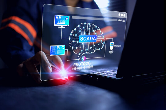 SCADA technology concept with a man programming and logic setting for real time checking and data analysis control process and monitor on human machine interface - Powered by Adobe
