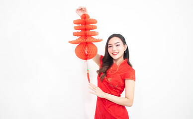 Smiling women celebrate Chinese New Year indoors, decorated with festive characters and papers, sharing happiness, prosperity, vitality and cultural bonds.