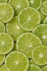 A vibrant display of lime slices, showcasing their bright green hue and intricate texture.