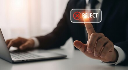 Businessman rejects application by pressing virtual reject button on screen with laptop in modern office