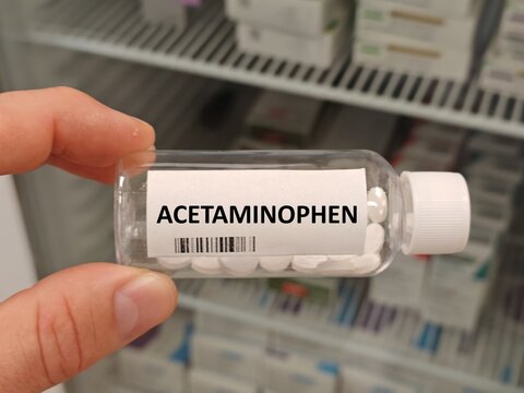 ACETAMINOPHEN box of tablets on hospital pharmacy table, used to relieve mild to moderate pain and reduce fever PARACETAMOL	