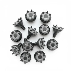 Golf shoe spikes in black color arranged on white background  