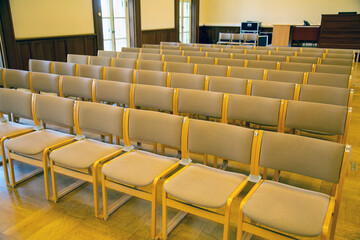 Grey chairs in the auditorium of the conservatory, lecture hall. Music organ symphony orchestra.